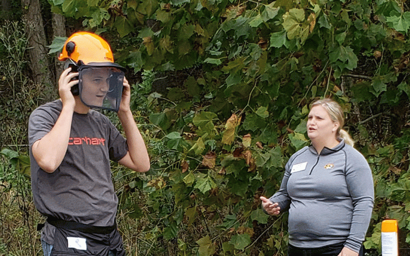 Sullivan FFA member learning about chainsaw safety at the Wurdack Farm Field Day in October.