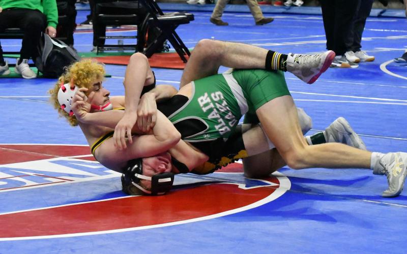 CONNER ROACH pinned down sixth place on the state podium in Columbia. Photo by Will Johnson Article Image Alt Text