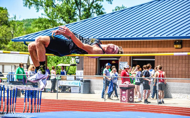 COLTON BRENDEL soared over the bar in the high jump competition and landed in 7th place. Photo by Will Johnson Article Image Alt Text