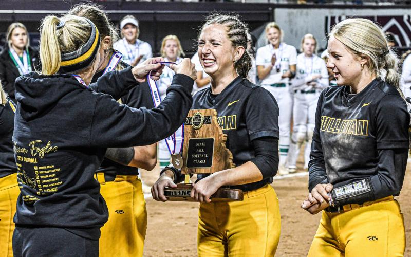 SLINGING HEAT. Ava Declue finished her high school career with first-team all-state honors. She put on a pitching clinic with a 1.53 ERA and 145 strikeouts. Photo by Extra Innings Photography Article Image Alt Text