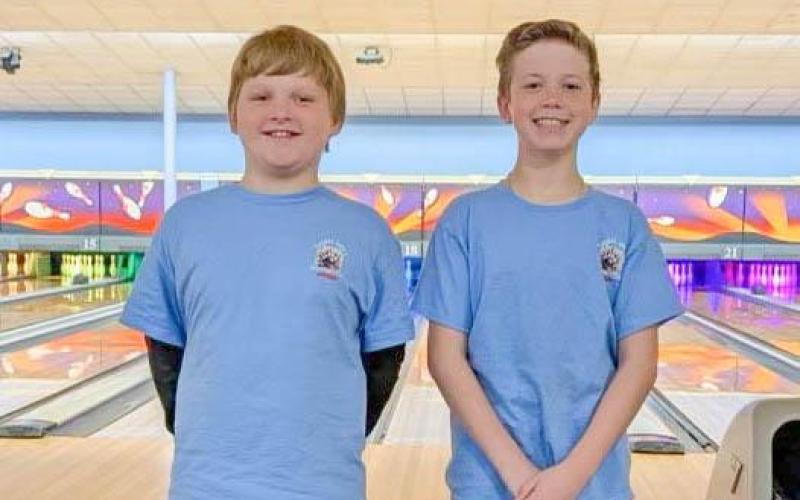 THUNDERSTRUCK. Jacob Shelton (left) and Benjamin Radosh (right) rolled in first place in doubles at Thunder Alley for the Four Rivers Championship. Submitted photo Article Image Alt Text
