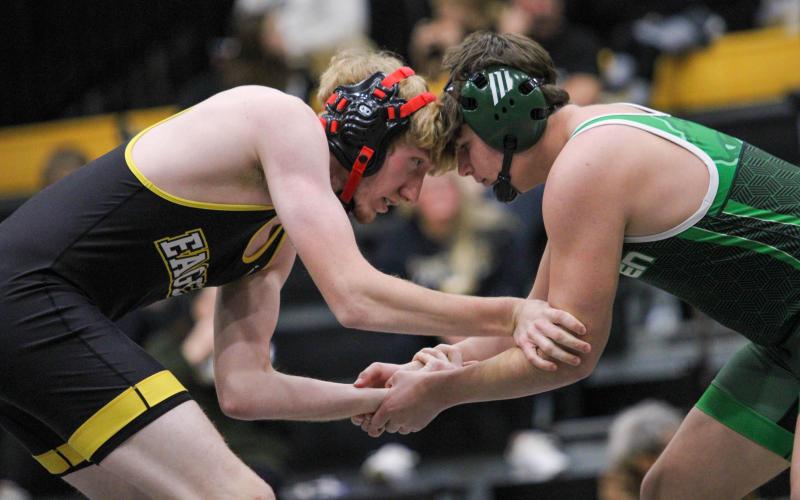 NOLAN STUDDARD tussles with his opponent. Photo by Wyatt Hardy Article Image Alt Text