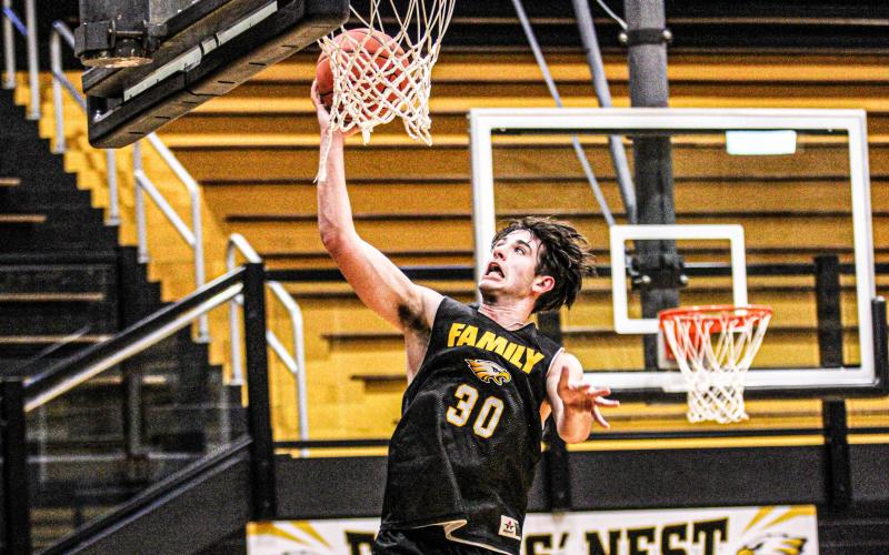 THE LAST DANCE. Cooper Donner returns his senior year after sitting out as a junior. He is excited to play the game he loves for one last time in Sullivan. Photo by Wyatt Hardy Article Image Alt Text