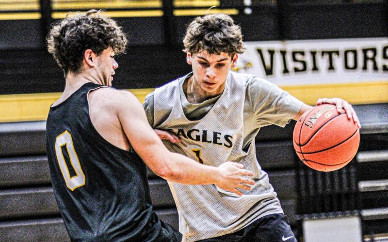 YOUNG GUNS. Sophomores Braxton Breen (left) and Spencer Thomure (right) will fire up the court. Photo by Wyatt Hardy Article Image Alt Text