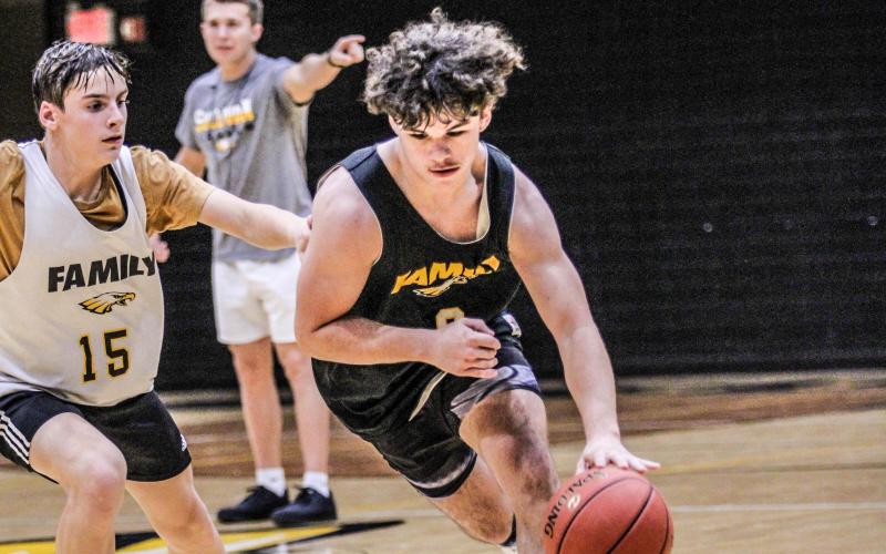 MAN TO MAN. Sullivan is fostering a winning culture in which each player contributes to victory. Head coach Kobe Wands wants his team to have fun with each game and lift one another up positively. Photo by Wyatt Hardy Article Image Alt Text