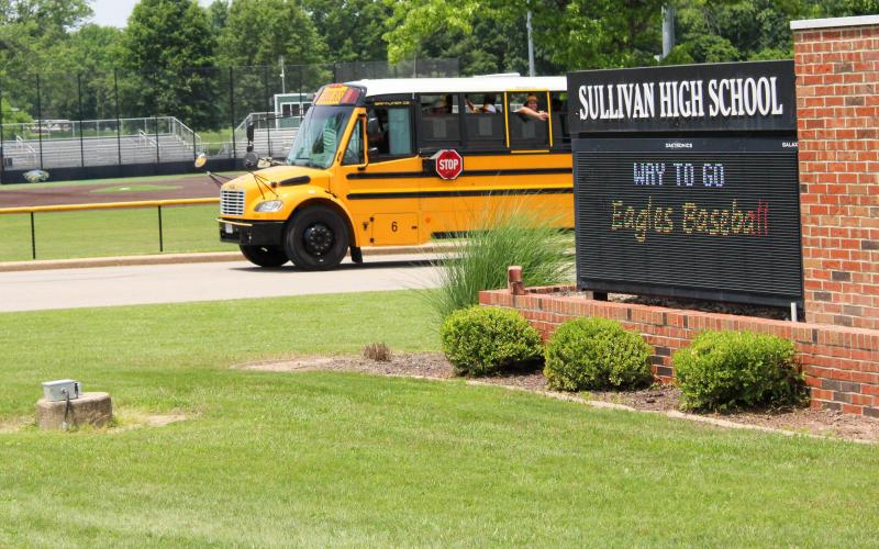 ONE LAST RIDE. Sullivan left the high school and then paraded around town before leaving for Ozark. Photo by Wyatt Hardy Article Image Alt Text