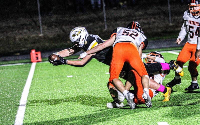 CROSS THE PLANE. Chase Blue extended his arm across the goal line for a score. Photo by Wyatt Hardy Article Image Alt Text
