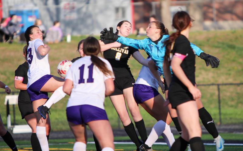MOLLY PILKENTON, starting goalie for Sullivan, dives to block a Pacific shot. Photo by Wyatt Hardy Article Image Alt Text