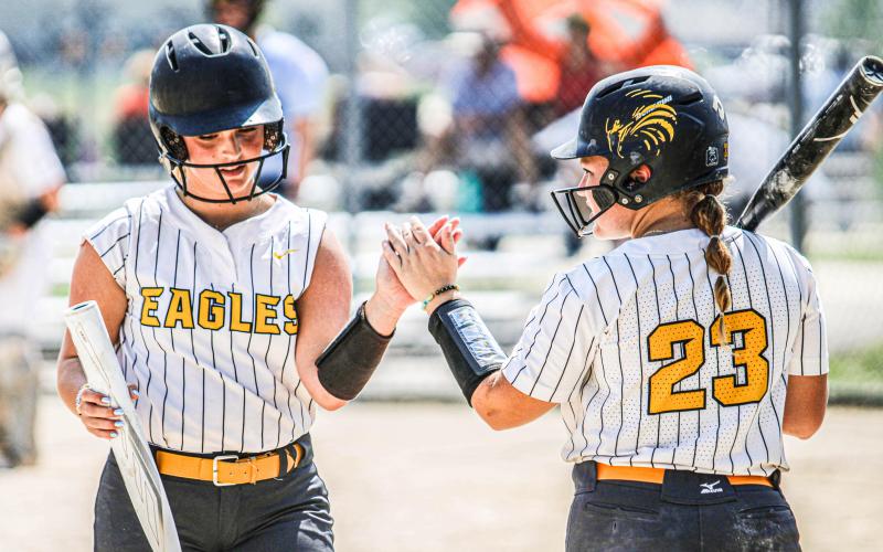 ONE LAST RIDE. Seniors Molly Lohden (left) and Dorie Richardson (right) received all-state honors. Photo by Wyatt Hardy Article Image Alt Text