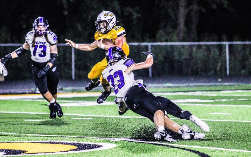 TAKE IT TO THE HOUSE. Mark Jennings (26) played lights out on Homecoming night. He rushed for a career-high 223 yards in Sullivan’s victory over Pacific. Photo by Wyatt Hardy Article Image Alt Text