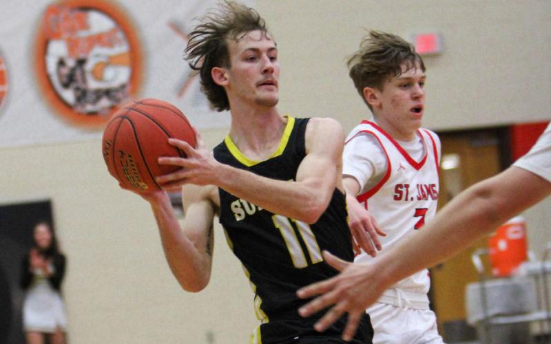 SETH VALLEY dishes out an assist. Photo by Wyatt Hardy Article Image Alt Text