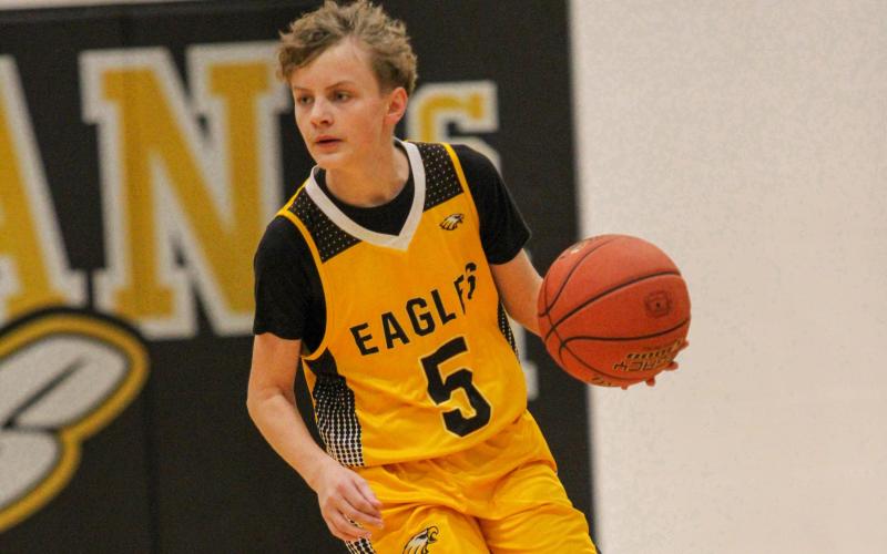 BLAKE McCULLOCH (5) drove the Eagles down the court. Photo by Wyatt Hardy Article Image Alt Text