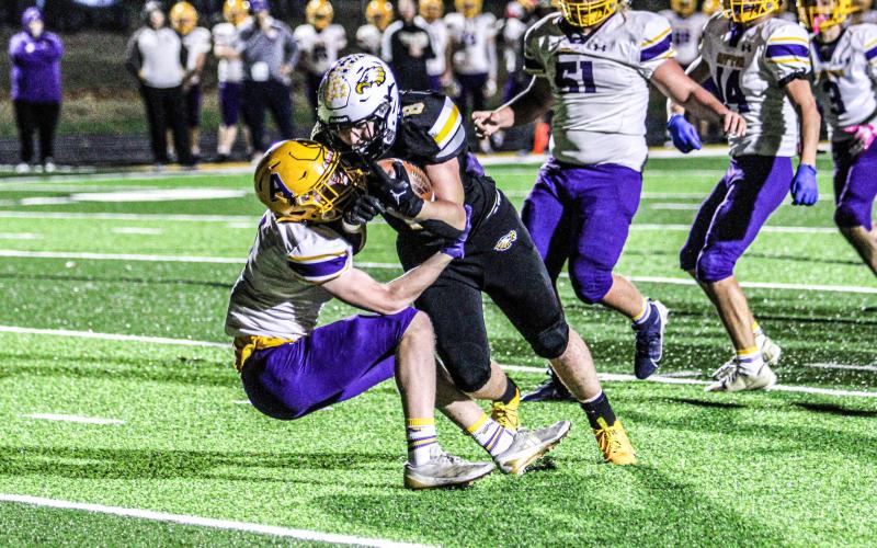 CHASE BLUE (8) punched in two touchdowns against the Cougars. Photo by Wyatt Hardy Article Image Alt Text