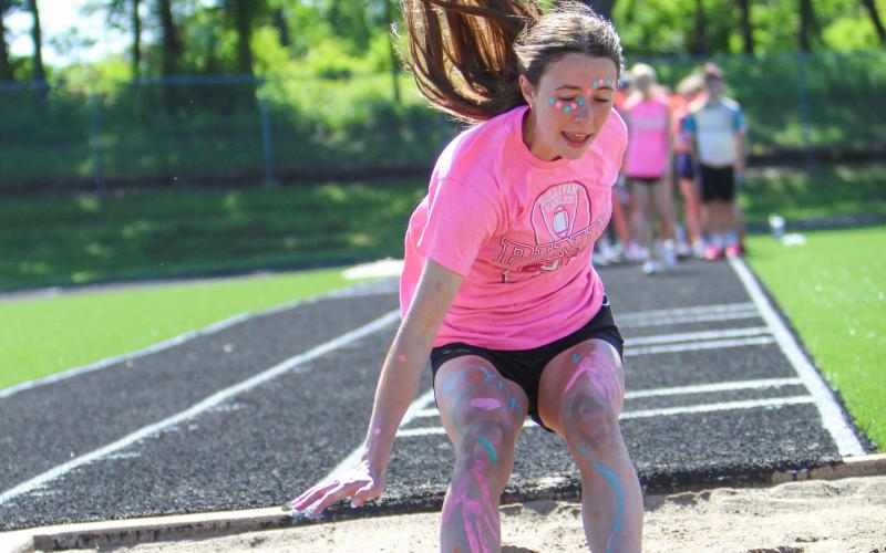 ONE FOR THE BOOKS. Karlee Head tied the long jump record at Sullivan High School with a leap of 5.58 meters. She won the event and qualified for sectionals. Photo by Wyatt Hardy @ 5/9 Intrasquad Meet Article Image Alt Text