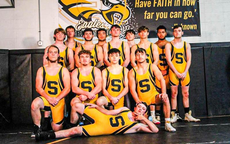 BACK TO THE MAT. Head coach Carl Lawrence will lead the boys wrestling team into another action-packed season for 2023-24. Their first meet will be in Washington on Wednesday, Dec. 6 at 5 p.m. Photo via SHS Eagles Media Instagram Article Image Alt Text