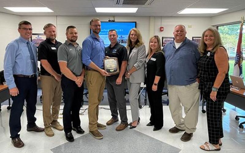 The Crawford County R-1 Board of Education received the Governance Team Award through the Missouri School Boards Association. They were honored during Thursday night’s monthly meeting. Cuba school board and MSBA board member Cheri Schuette presented the board with the award. From left to right: Superintendent Dr. Kyle Gibbs, Jason Gobin, Sean Kaysinger, Stephen Waldron, Andrew Graddy, Suzanne Louderman, Jessica Sutton, Marty de la Torre and Schuette Article Image Alt Text