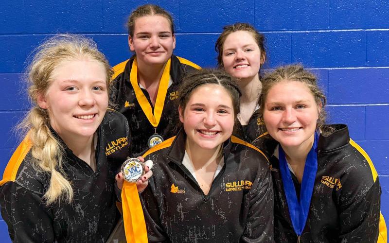 ON A ROLL. The Lady Eagles kicked off their season strong at the Wright City Tournament on Saturday, Nov. 23. Sullivan brought five wrestlers to the meet (pictured from left to right): Ruby Daily, Abigail Erfurth, Chloe Carson, Katie Summers and Dorie Richardson. Photo via Sullivan High School Wrestling X Article Image Alt Text