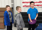 Fourth grade student, Caden, and second grade student, Beau waiting to go through the Hidden Maze while STUCO member, Cade prepares the maze.