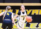 DOWN TO THE WIRE. When Sullivan was down 31-28 with 3 seconds left, Olivia Barton (3) clutched a three-pointer to send the Cuba game into overtime. Photo by Wyatt Hardy. Article Image Alt Text