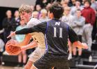 UNDER PRESSURE. Sophomore guard Peyton Malady looks for a Sullivan player to throw to. He had three steals, two points and two rebounds against DeSoto. Photo by Wyatt Hardy on Jan. 5 @ Sullivan vs. Northwest game. Article Image Alt Text