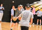 NEW FACES. Freshman Raiden Redd trains for his pitching on the mound. Photo by Wyatt Hardy Article Image Alt Text