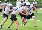 BACK ON THE GRIND. Chase Blue (8) will return as a running back for Sullivan. Photo by Wyatt Hardy Article Image Alt Text